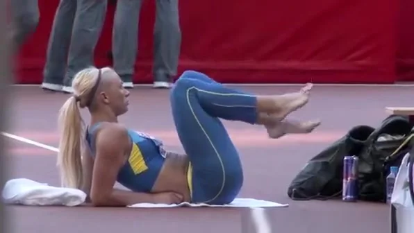 Sexy blonde athletic warming up