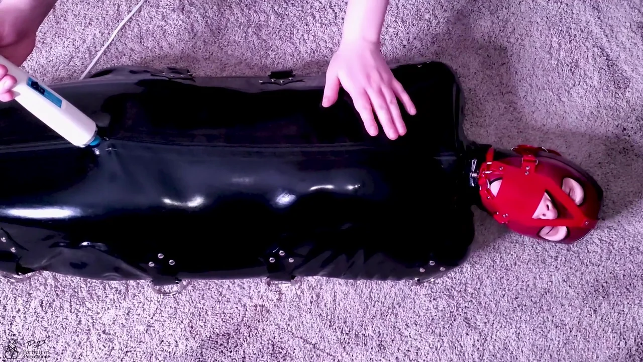 Tiny Slut Is Muzzle Gagged Then Locked In A Latex Sack & Made To Cum On A Magic Wand!