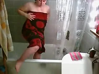 Big natural tits woman showering