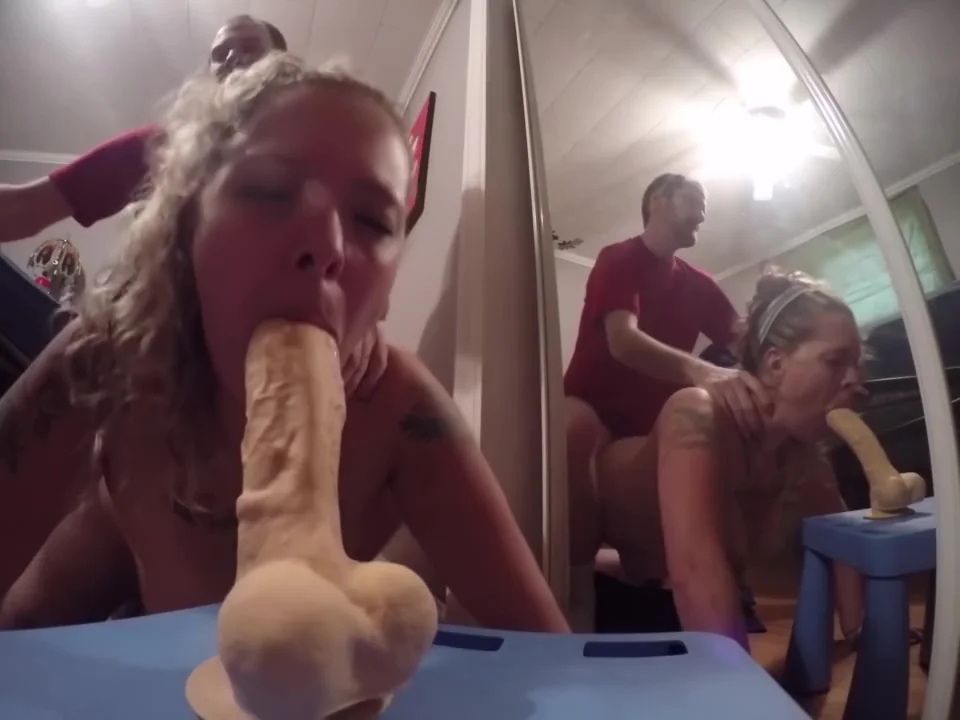 slut sucks big dildo during anal fucking