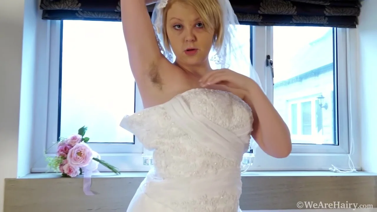 This wife masturbates in her dress