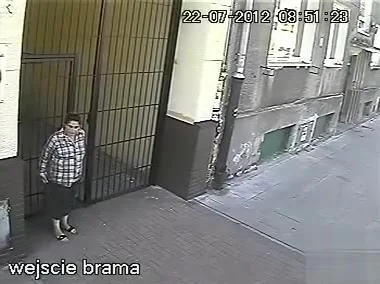 Elder lady taking a leak on the street