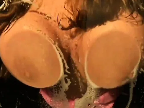 Busty babe uses her giant titties to please a dick before riding it