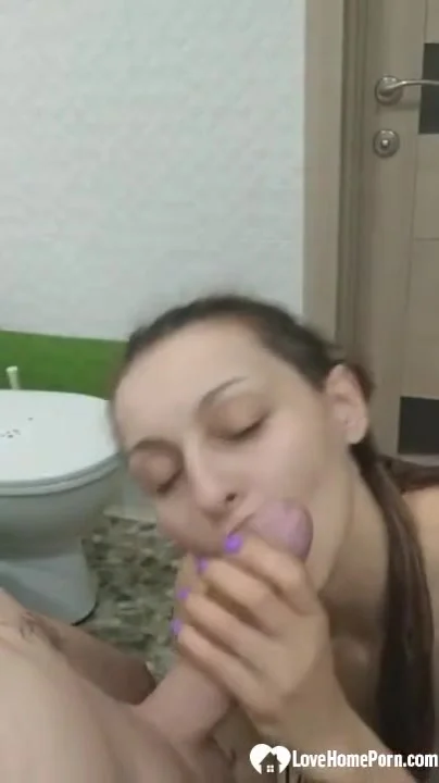 Amateur brunette wife swallows her husbands cum in the bathroom