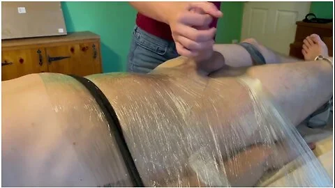 Intense Post Orgasm Stroking While Hes Bound To The Table