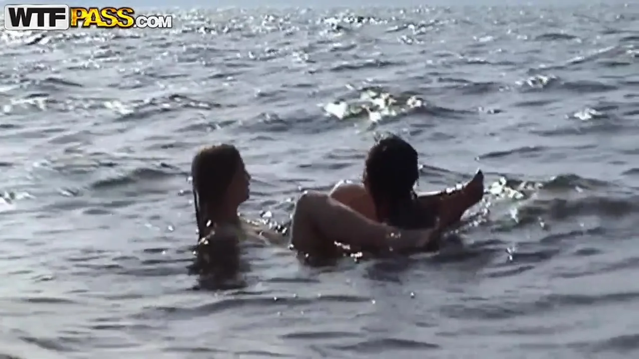 Petite babe Angelina in bikini gives head outdoor