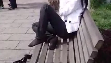 Candid nylon feet in the park
