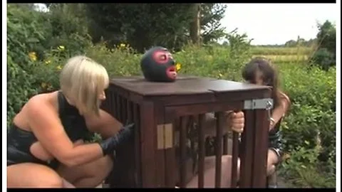 Three dominatrices and a caged sissy thrall