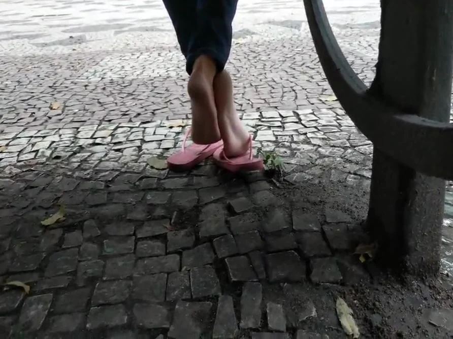 Candid girl feet and soft soles in public square