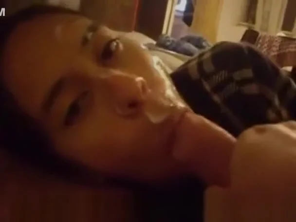 Slut wife plays with cum in her face