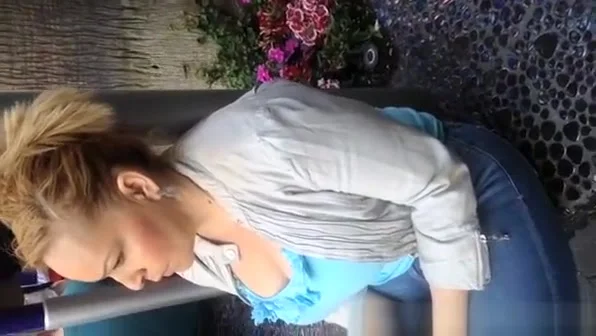 Busty woman downblouse and cleavage