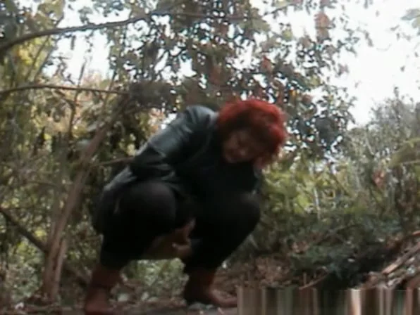 Mature redhead pee in the forest