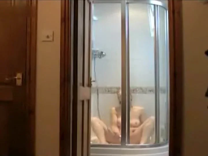 Milf spied masturbating in the shower