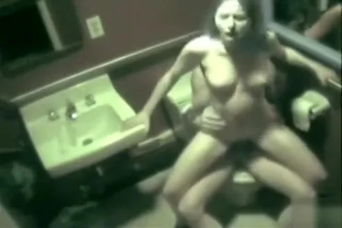 Security cam captures couple fucking in restroom
