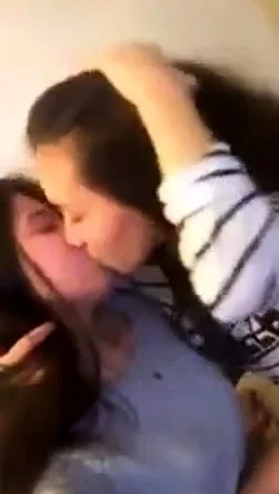 Girls kiss in webcam