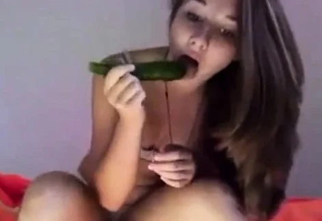 Beautiful teen with zucchini in the ass and pussy