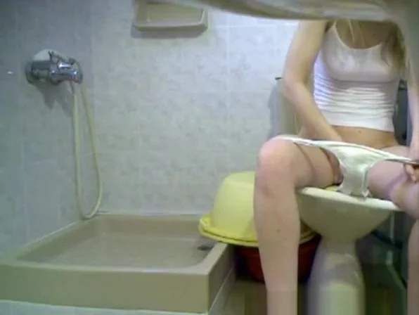 Girls Peeing in Toilet