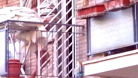 spying neighbour milf with great legs on balcony