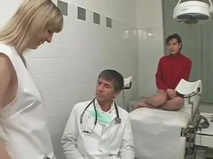 Doctor and nurse team on a patient