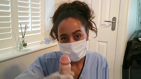 SEXY BLACK BRITISH NURSE GIVES HANDJOB WEARING SURGICAL MASK AND GLOVES