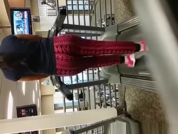 Big ass in sports pants walking