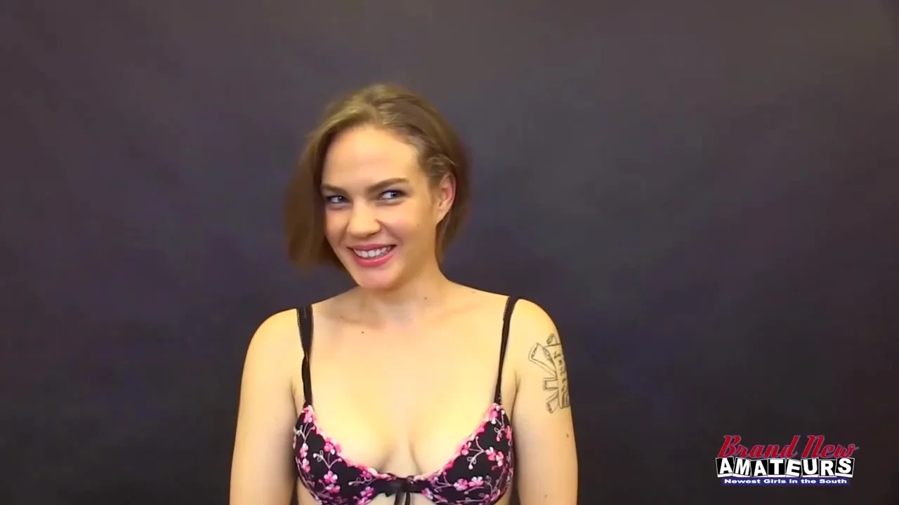 Tattooed, blonde teen 18+ with blue eyes is using her deep throat to satisfy a black man