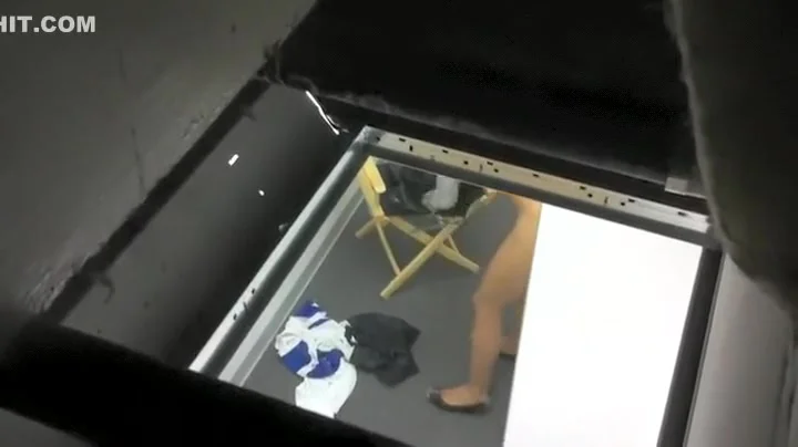 Skinny girl spied from the ceiling