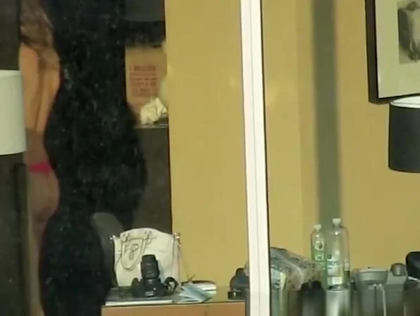Hot chick spied through hotel window