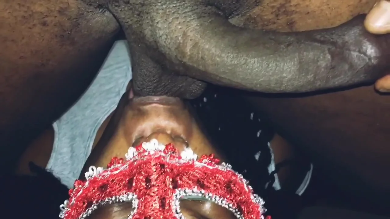 Masked lady sucks black balls