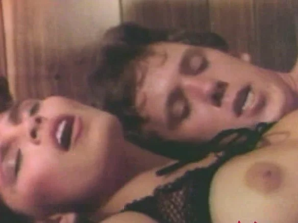 Tom Byron lays some of his mighty pipe into a kinky brunette tart