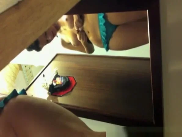 Brunette girl trying new underwear