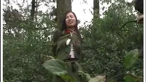 Chinese army girl tied to tree 1