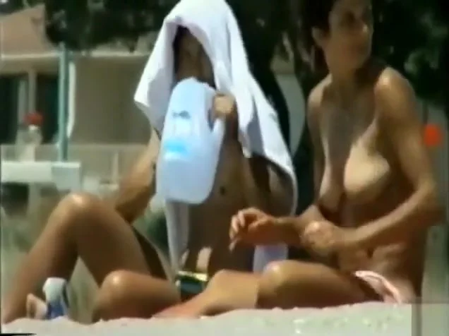Steamy beach day with a nice natural tits girl