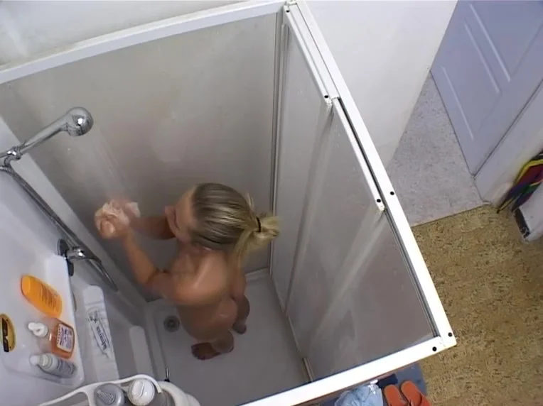 Overhead view of Kristen in the shower
