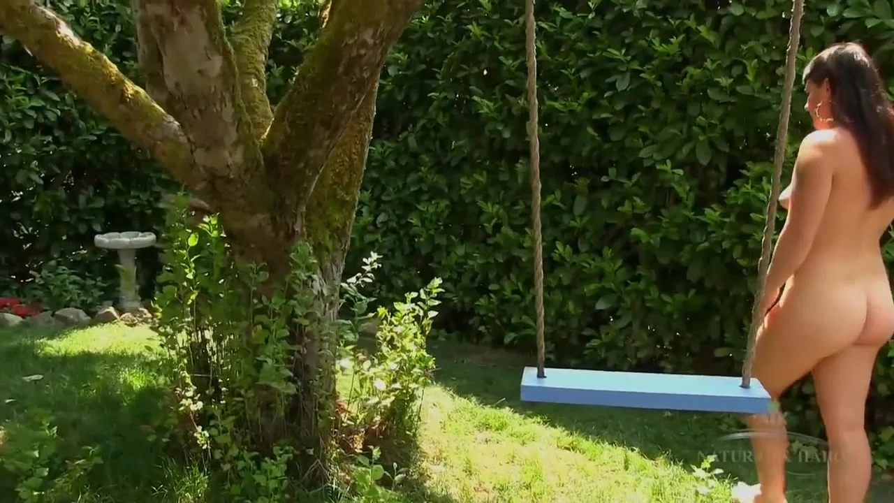 Mature Lady In Garden