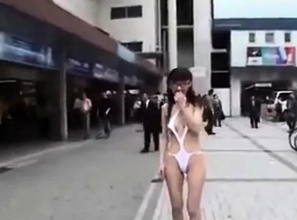 Walking semi-nude in Tokyo Streets