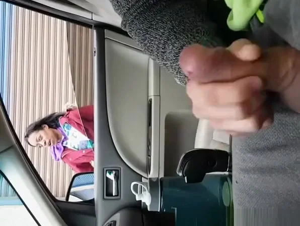 Guy plays with his cock in car