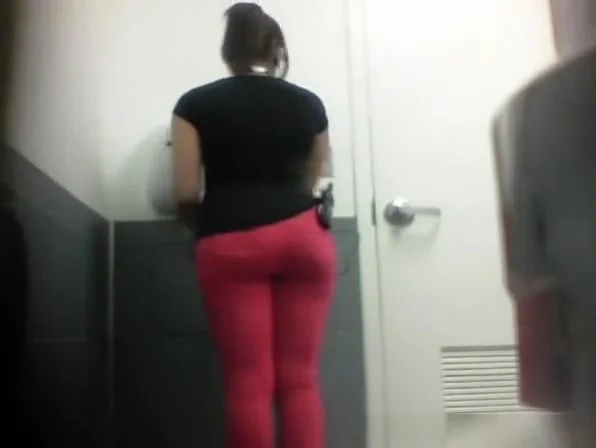 Ebony girl caught peeing in toilet