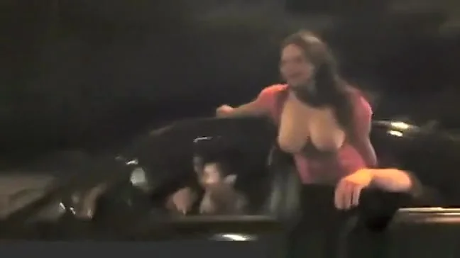 Shows tits while driving in the car