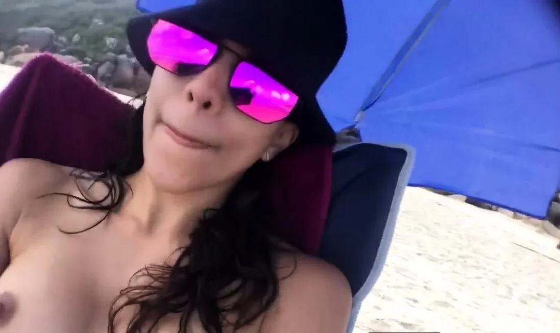 First-time Nudist Hesitates to Undress on Beach