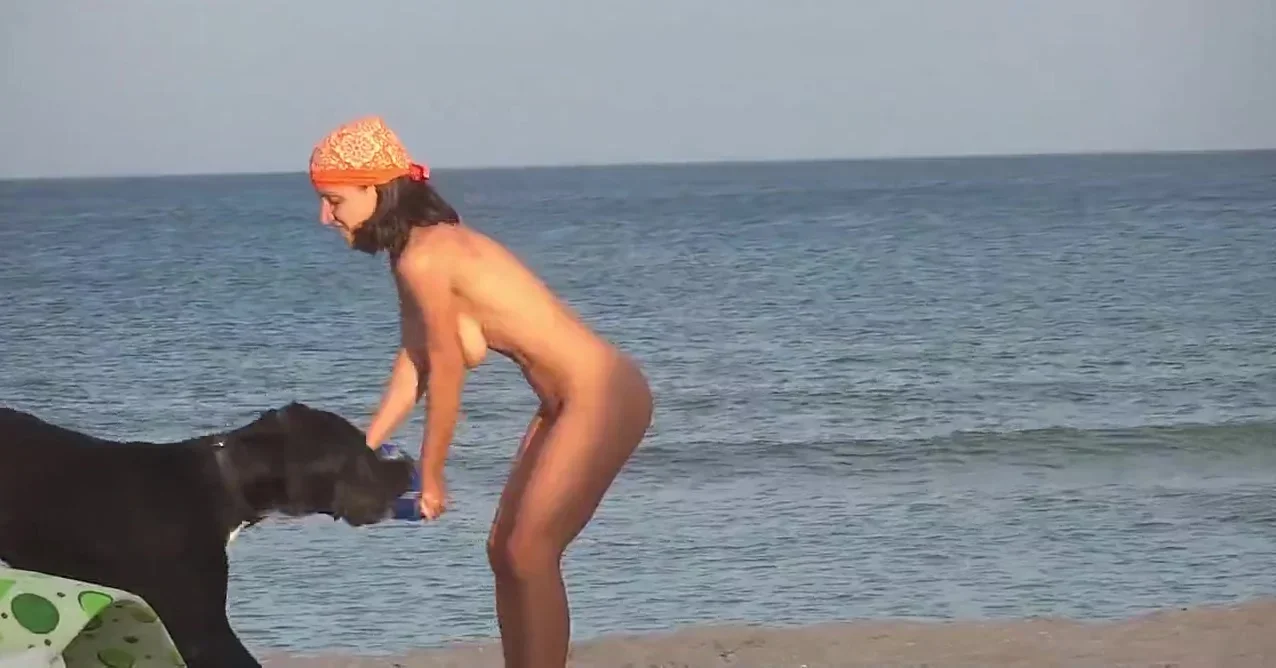 Perfect slim girl playing on the beach