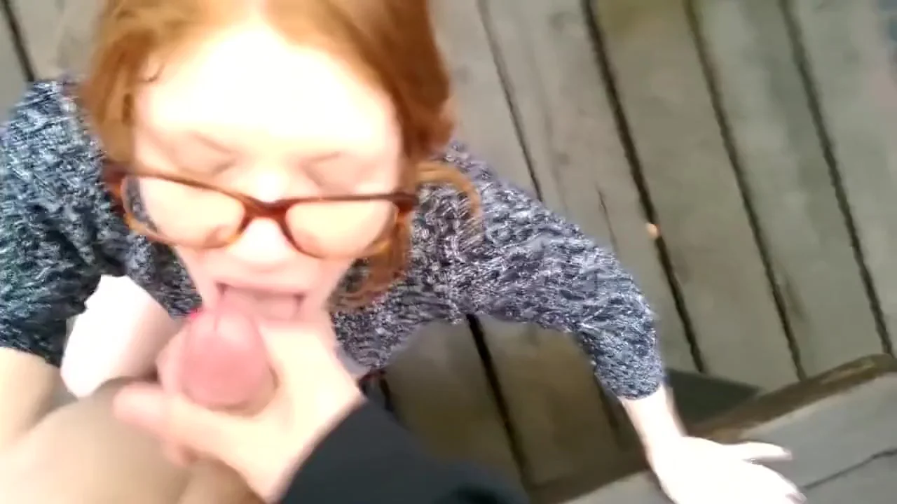 Redhead blows and fucks in public
