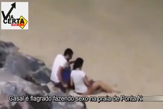 Italian lovers having missionary sex on the beach