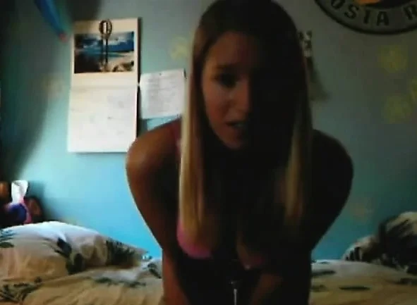Coed girl with firm tits fingers her kitty in the chatroom