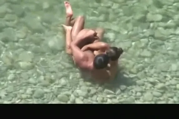 Nudist couple made sex in the water