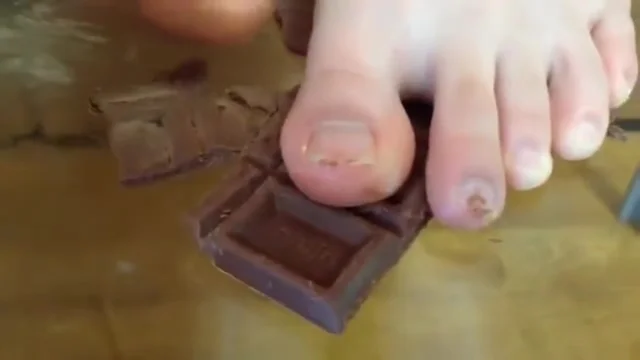 Asian wife jokes with her husband and tells him to lick his feet