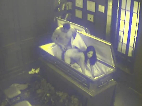 Odd couple gets off on fucking inside of a casket at a funeral home