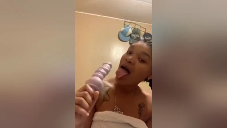 Petite Ebony Shows Small Tits