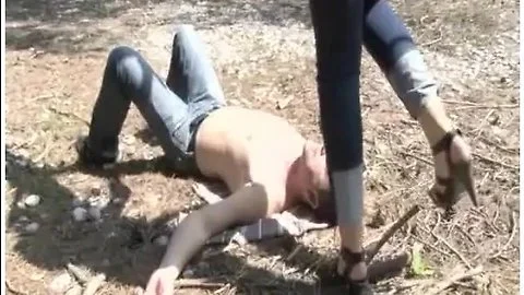 Sexy Dominant Lady In High Heels Does Some Eye And Tongue Trampling On Her Male Foot Slave Outdoors