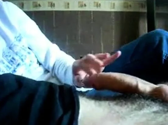 Handjob While Watching TV